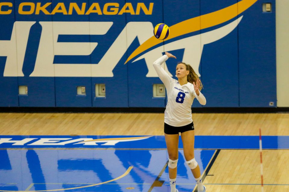 Helen playing volleyball