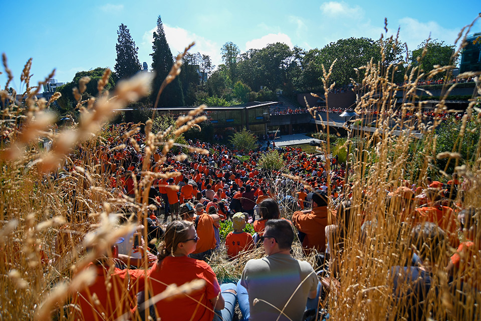 Large crowd gathered outside the Indian Residential School History and Dialogue Centre at UBC on Orange Shirt Day. (Photo credit: Clare Kiernan)