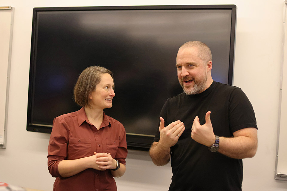 Co-instructors Dr. Jenny Peterson and Dr. Gabriel Potvin stand together in front of a class