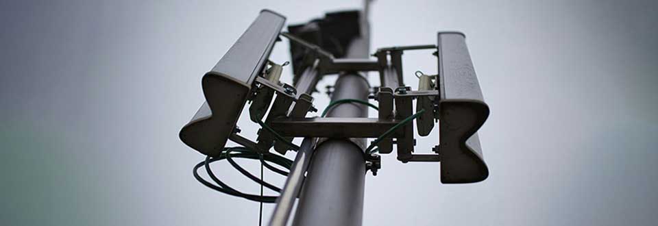 View looking up at a cell tower