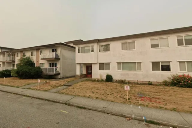 Row of white houses in Burnaby from Google Maps street view