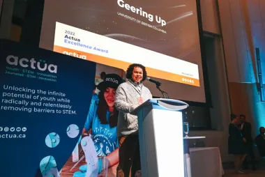 Andrew Jamison of UBC Geering Up accepts the Actua 2022 Award for Excellence