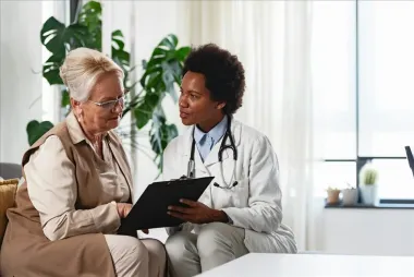 Nurse with elderly patient