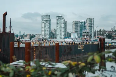 A Seaspan Ferries barge and tugboat overlook the New Westminster waterfront