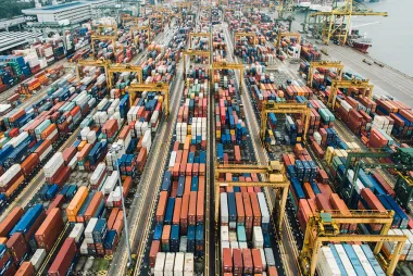 An aerial view of shipping containers at a port
