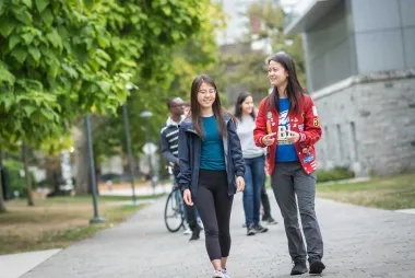 Engineering students walking and talking outside