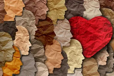 Mosaic of silhouettes with a red heart embedded