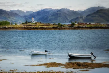 resting still image of boats in the water. 