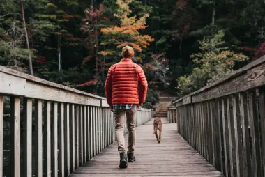 man walking dog