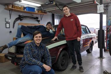 Alumni get-together building a "racecar"