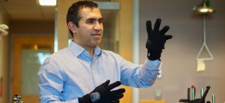 Dr. Peyman Servati demonstrates the smart glove