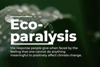 A close-up of a plant with beads of water in the background, covered in white font that defines eco-paralysis as the response people give when faced by the feeling  that one cannot do anything meaningful to positively affect climate change