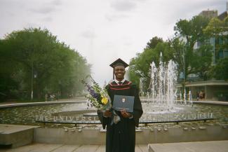 UBC CHBE student Kenechukwu Ene posing for a photo at graduation