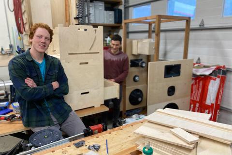 Cam Younger and Francesco Ferri, two Mechanical Engineering students at UBC at the design studio on Quadra Island