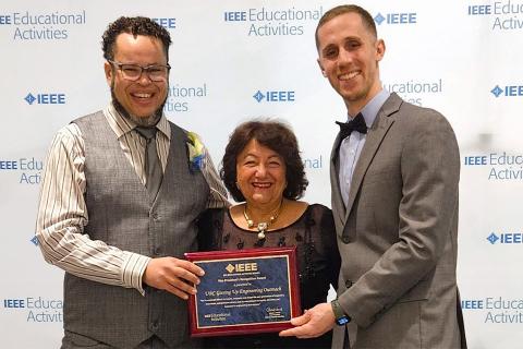 Andrew Jamison and Adam Cornford receive the Vice President’s Recognition Award from Dr. Rabab Ward on behalf of Geering Up.