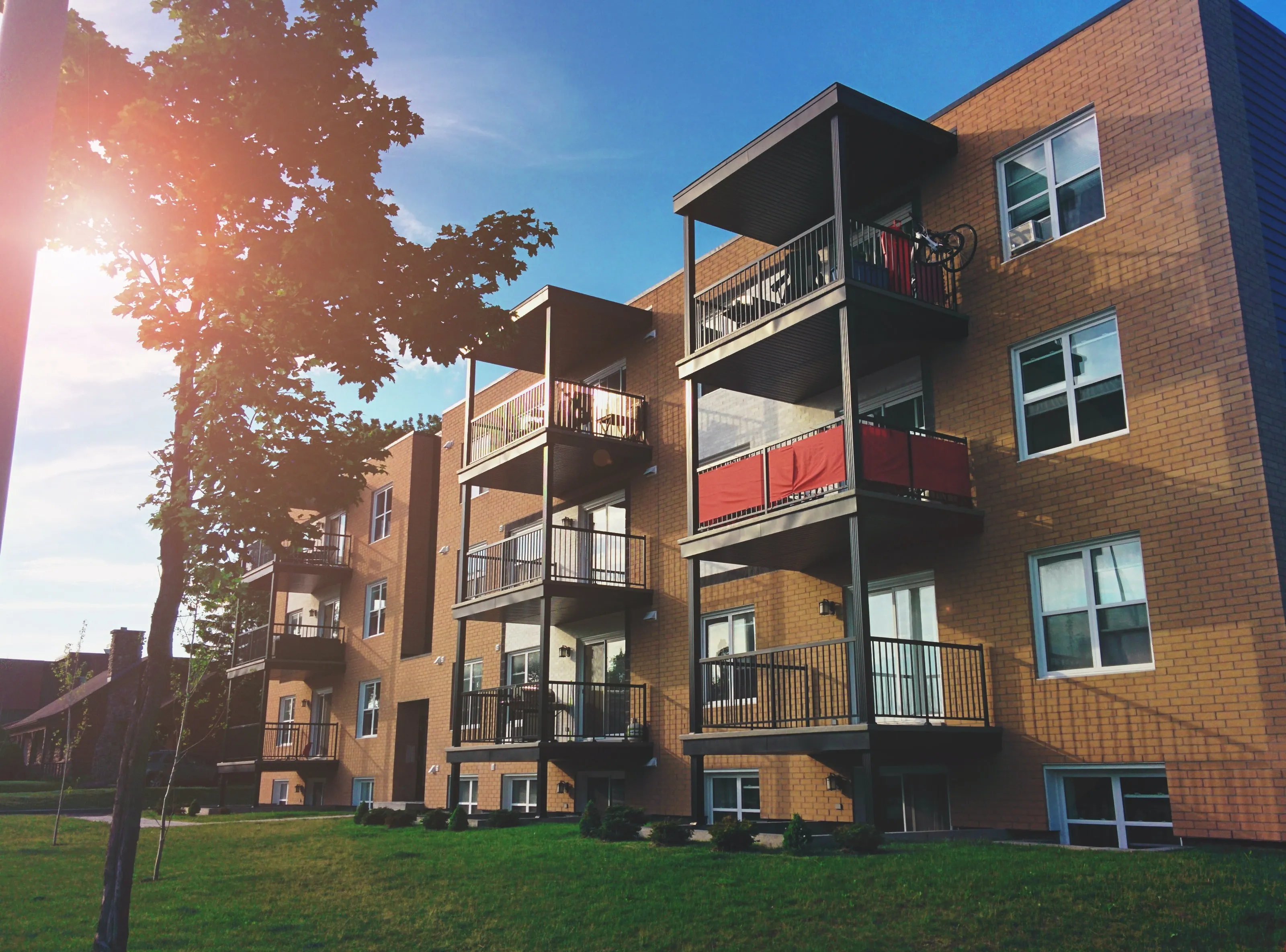 apartment building with sun shining